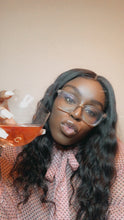 Load image into Gallery viewer, Our CEO is pictured with our Luscious Loose Wave Virgin Hair extensions, worn in its natural texture (3 bundles of 20 inches + 5x5 Transparent Lace Closure, sewn into a custom wig). Grab a glass Babe, we are toasting up to this beautiful loose wave hair texture!
